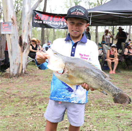 junior holding fish